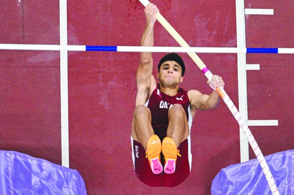 Qatar's athlete Seifeldin Heneida Abdesalam competes in the men's pole vault final during the World Athletics Championships in Tokyo, on Monday. AFP