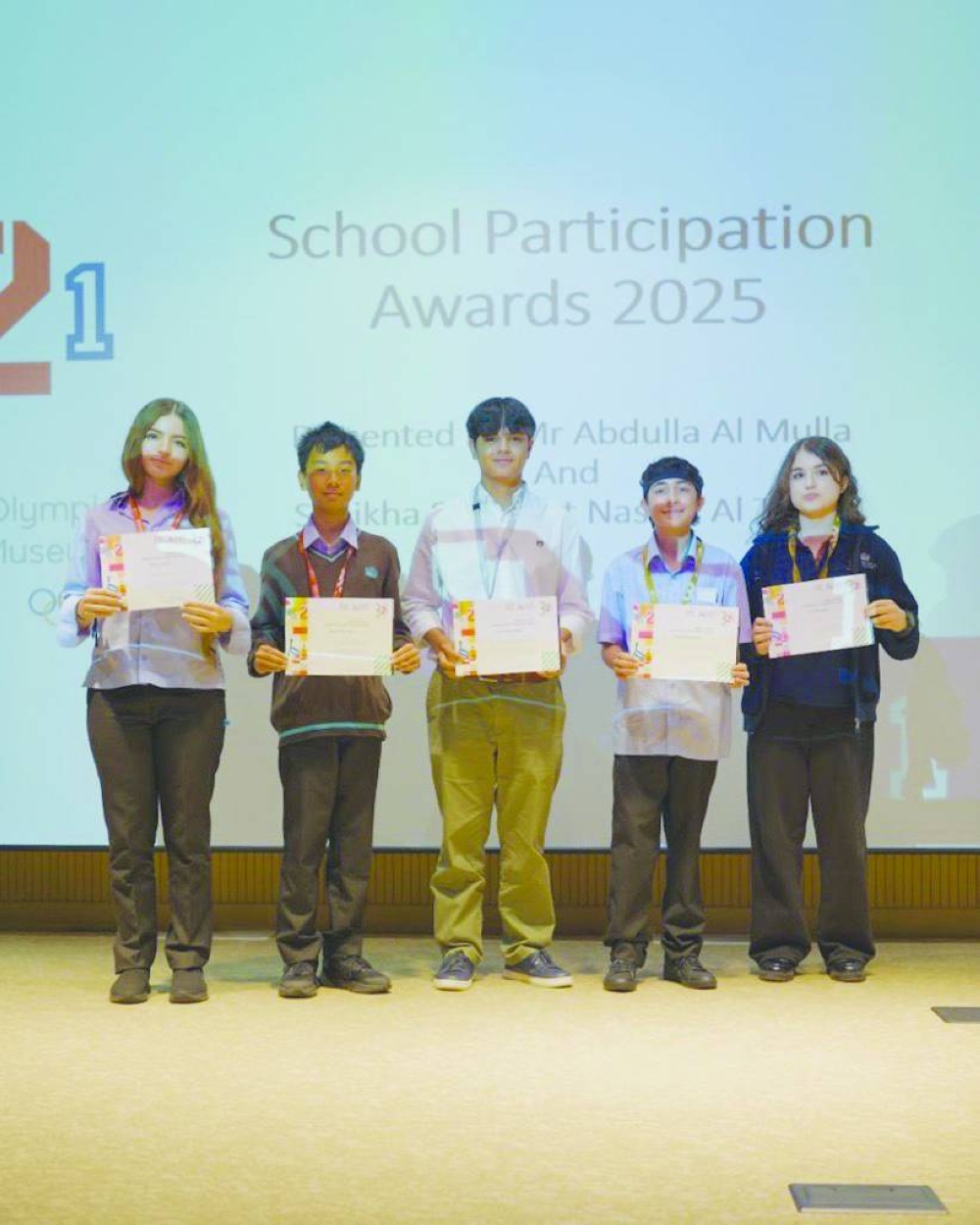 Some of the winners of the first-ever Cultural Olympiad Expo receiving their awards.