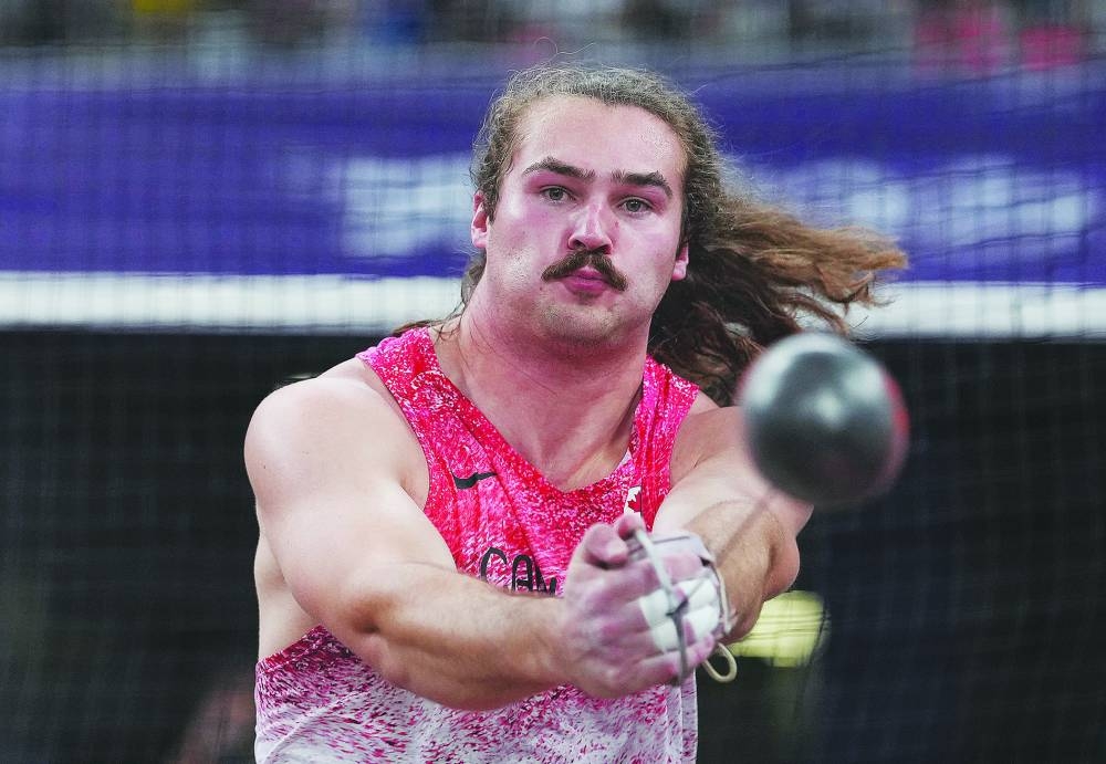 Canada's Ethan Katzberg claimed a third global hammer title in three years when he launched his second attempt a massive 84.70 metres. REUTERS