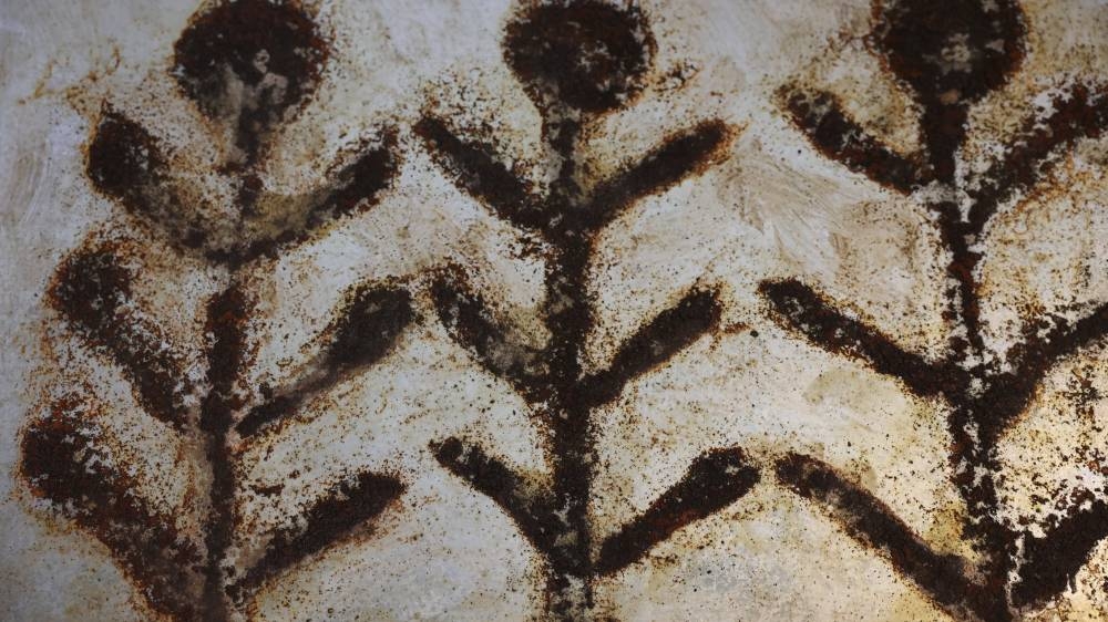 Art work from 'Between Rust and Art' exhibition poster