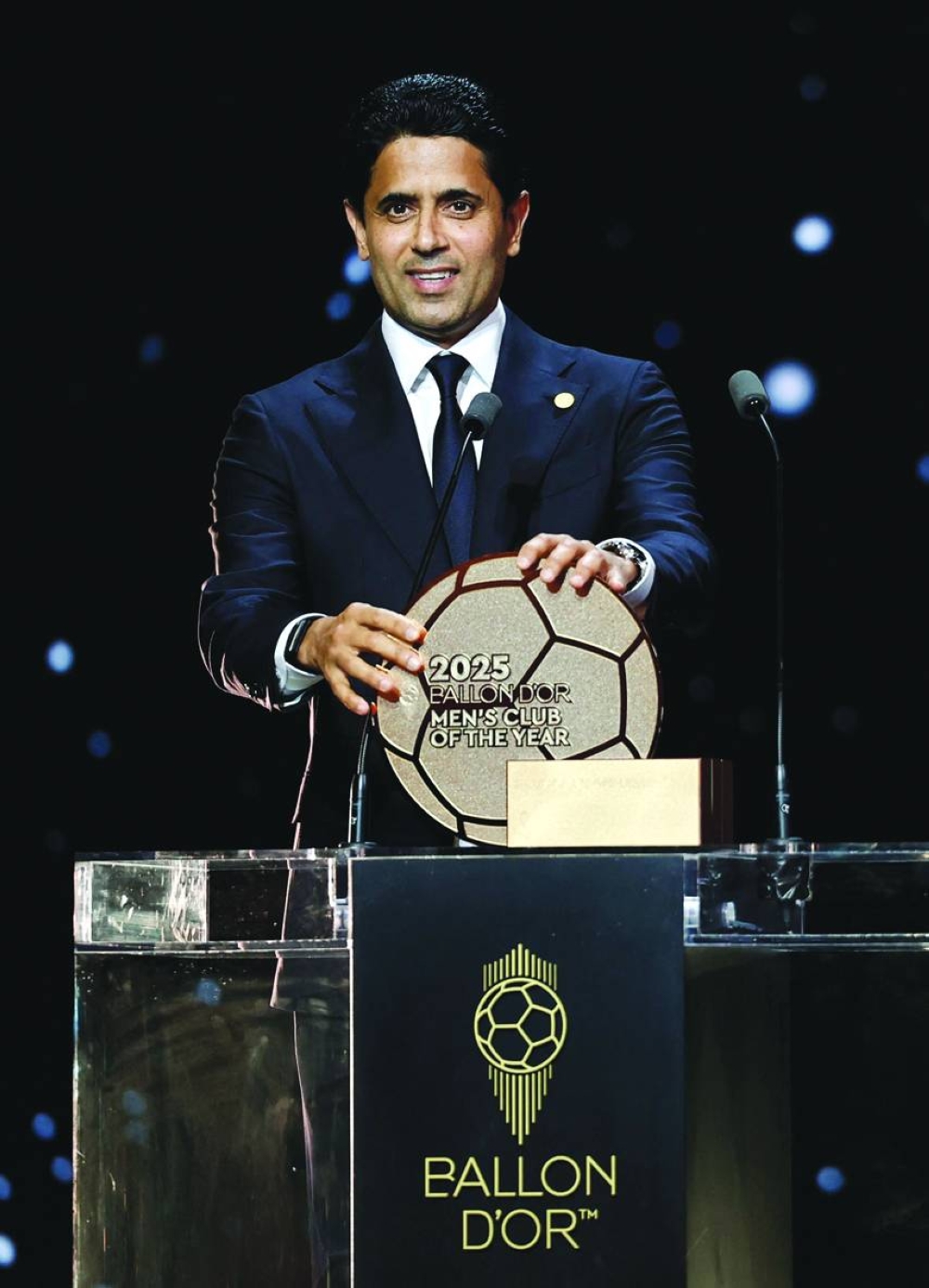 Paris St Germain (PSG) president Nasser al-Khelaifi makes a speech after winning the 2025 Ballon d'Or Men's Club of the Year award.