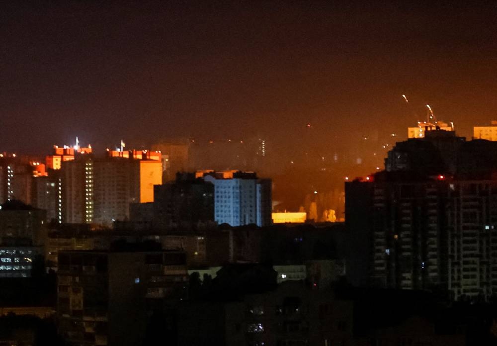 An explosion of a drone lights up the cityscape during a Russian missile and drone strike, amid Russia's attack on Ukraine, in Kyiv, Ukraine September 28, 2025. REUTERS