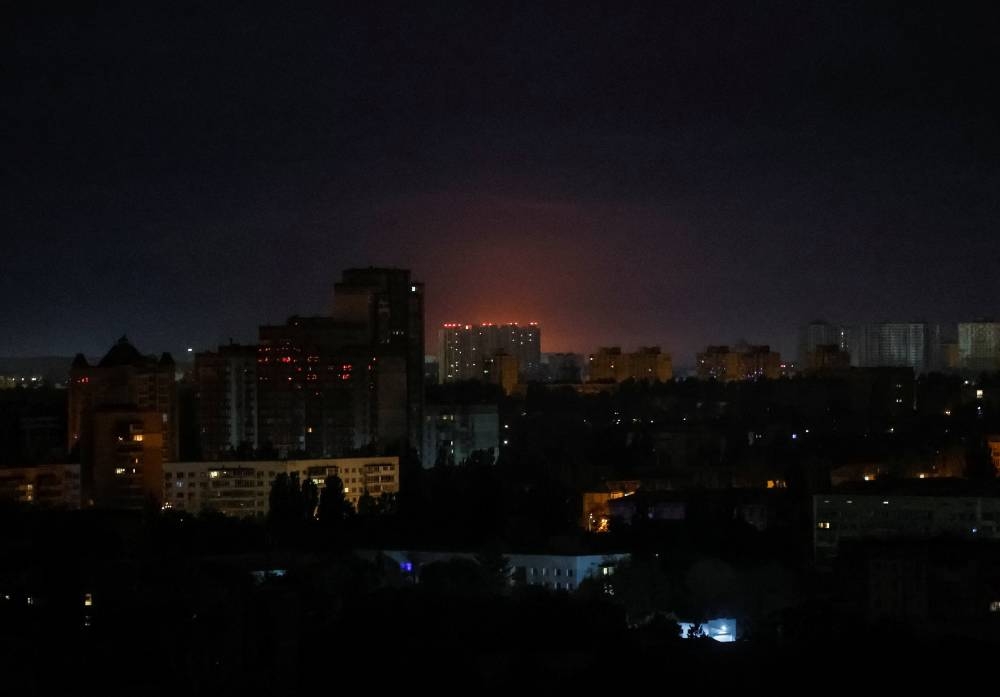 An explosion lights up the sky over the city during a Russian missile and drone strike, amid Russia's attack on Ukraine, in Kyiv, Ukraine September 28, 2025. REUTERS