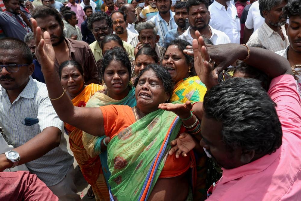 Relatives of the victims mourn in front of Karur Government Medical College hospital, following a stampede incident at an election campaign rally held by Tamilaga Vettri Kazhagam party, in Karur district of Tamil Nadu, India, on Sunday. REUTERS