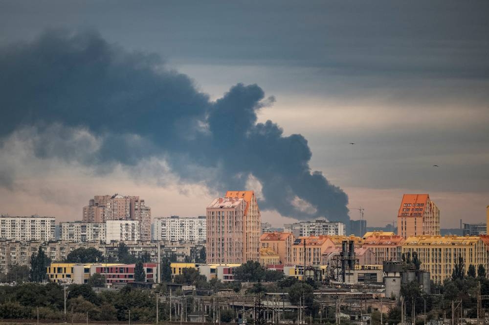 Smoke rises over the city after Russian drone and missile strikes, amid Russia's attack on Ukraine, in Kyiv, Ukraine, on Sunday REUTERS