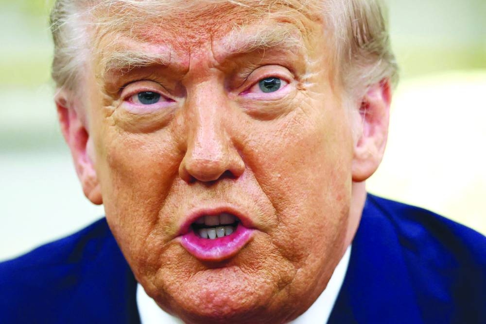 
SPOTLIGHT: US President Donald Trump speaks at a meeting in the Oval Office at the White House in Washington, DC, on Thursday. (Reuters) 