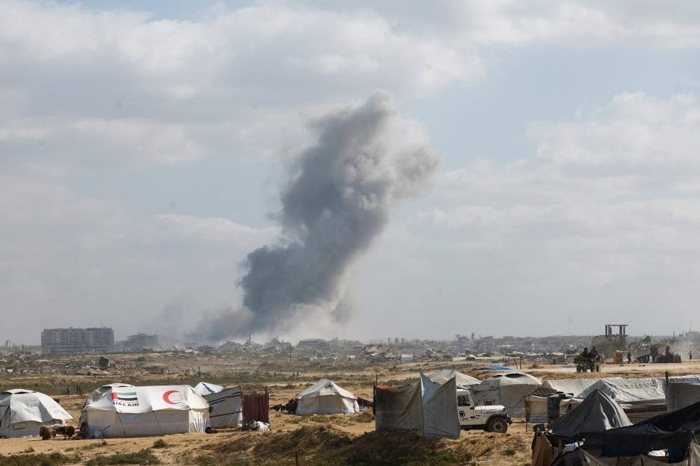 Smoke rises during an Israeli military operation in Gaza City, as seen from the central Gaza Strip, on Wednesday. REUTERS