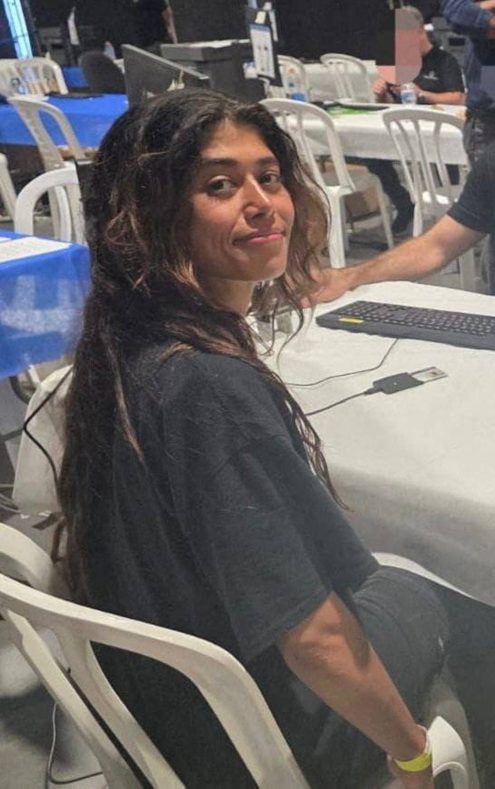 Member of the European Parliament Rima Hassan sits at an unknown location, after Israel intercepted the vessels of the Global Sumud Flotilla aiming to reach Gaza and break Israel's naval blockade, in this handout image released, on Friday. 