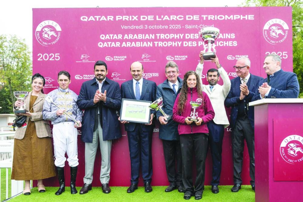 HE Sheikh Joaan bin Hamad al-Thani, President of Qatar Olympic Committee, received the Qatar Arabian Trophy des Pouliches in the presence of Guillaume de Saint-Seine, President of France Galop, and Khalifa bin Mohammed al-Attiyah, QREC Board Member, following the victory of Al Shaqab Racing’s homebred Subahiyah in Group 1 race of three-year-old Purebred Arabian fillies. 