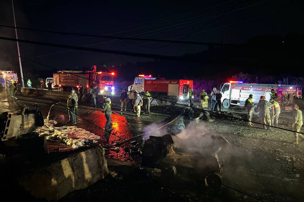 Rescuers and first-responders gather at the scene of an overnight Israeli strike in Al-Msayleh area in southern Lebanon on October 11, 2025. Lebanese President Joseph Aoun condemned Israel on October 11 for carrying out overnight strikes on civilian facilities that the health ministry said killed at least one person. (AFP)
