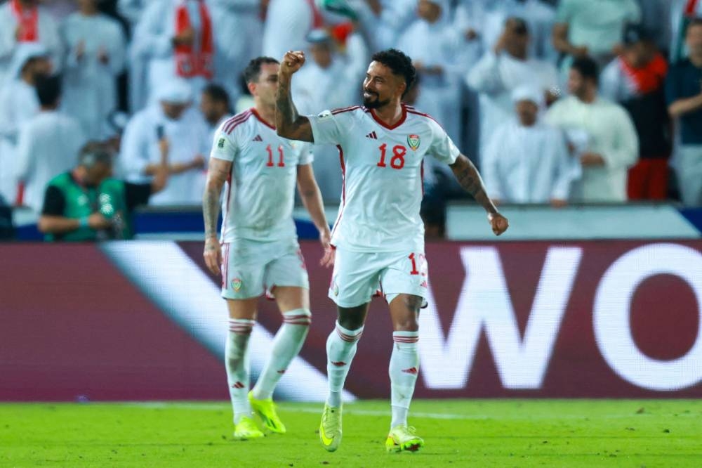 UAE's forward #18 Caio Lucas celebrates after socring his team's second goal during the FIFA World Cup 2026 Asian qualifier football match between United Arab Emirates and Oman at Jassim Bin Hamad Stadium in Doha on Saturday. AFP