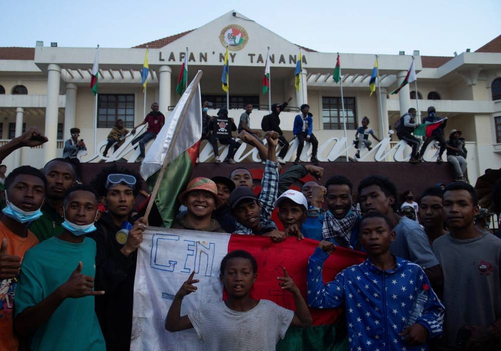 Protesters chant slogans as they gather during a nationwide youth-led protest over frequent power outages and water shortages, in Antananarivo, Madagascar, on Saturday. REUTERS