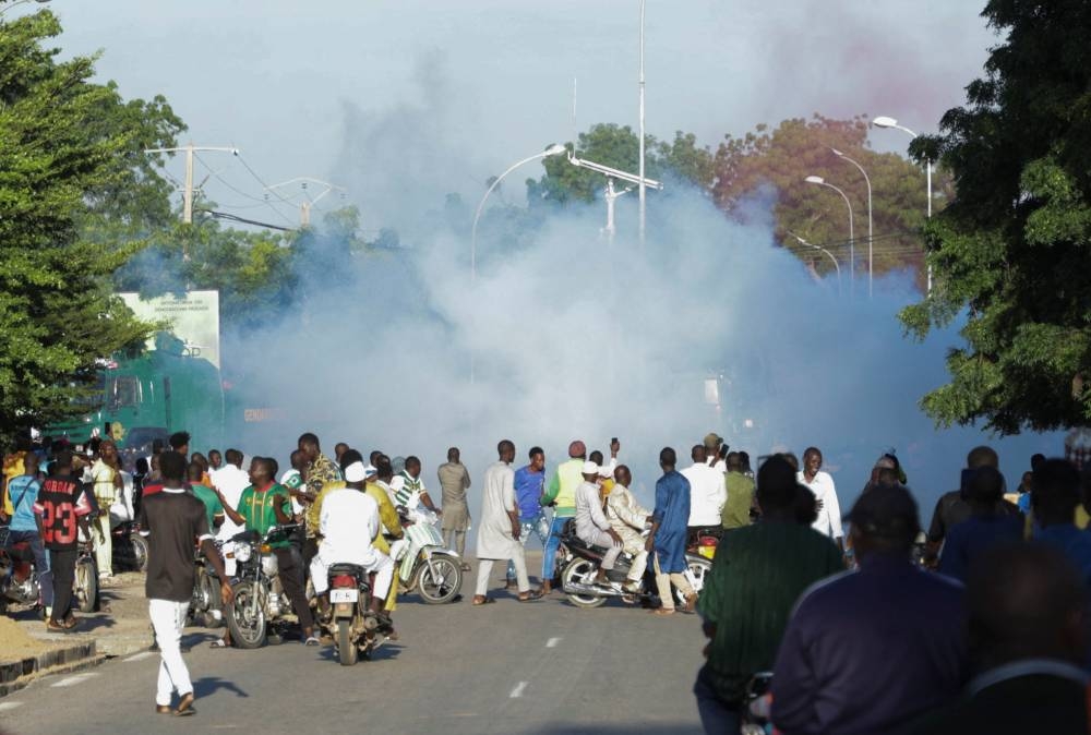 Security forces release tear gas during clashes with supporters of presidential opposition candidate Issa Tchiroma Bakary of the Cameroon National Salvation Front (FSNC) on the day of the presidential election in Garoua, Cameroon, on Sunday. REUTERS