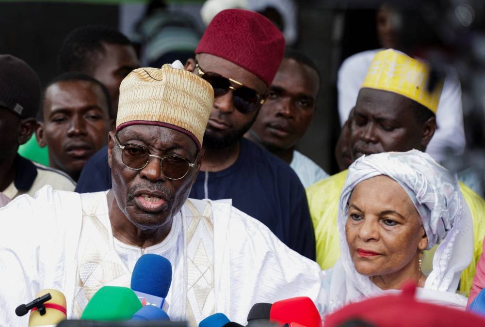 Presidential candidate Issa Tchiroma Bakary of the Cameroon National Salvation Front (FSNC) speaks to the media after casting his vote on the day of Cameroon’s presidential election at the polling station of Ecole Maternelle de Foulbere in Garoua, Cameroon, on Sunday. REUTERS