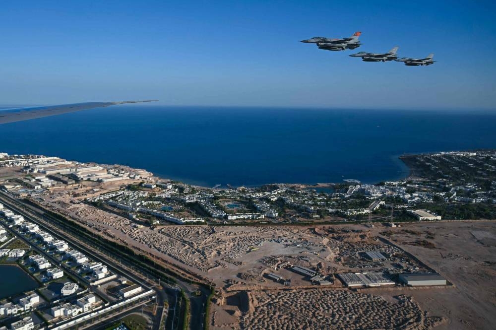 Egyptian flighter jets escort the Air Force One with US Donald Trump onboard before his arrival in Sharm el-Sheikh on Monday, to attend a summit on Gaza. AFP