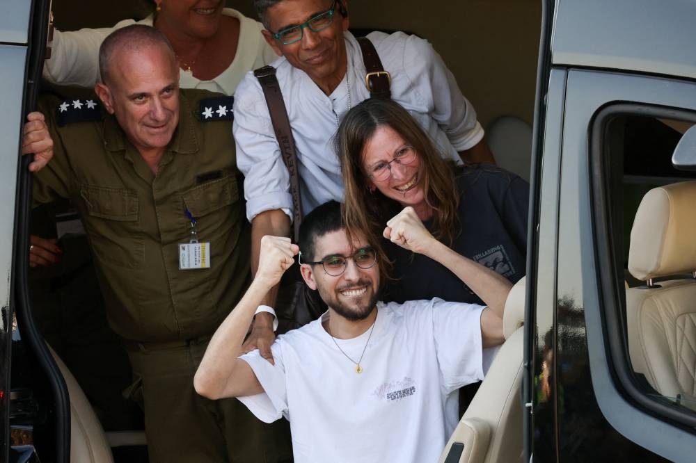 Released hostage Evyatar David, reacts upon arrival at the site of Rabin Medical Center-Beilinson Hospital, amid a hostages-prisoners swap and a ceasefire deal between Israel and Hamas in Gaza, in Petah Tikva, Israel, on Monday. REUTERS