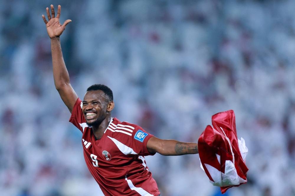 Qatar's forward #9 Mohammed Mountari celebrates at the end of the FIFA World Cup 2026 Asian qualifier football match between Qatar and the UAE at Jassim Bin Hamad Stadium in Doha on Tuesday. AFP