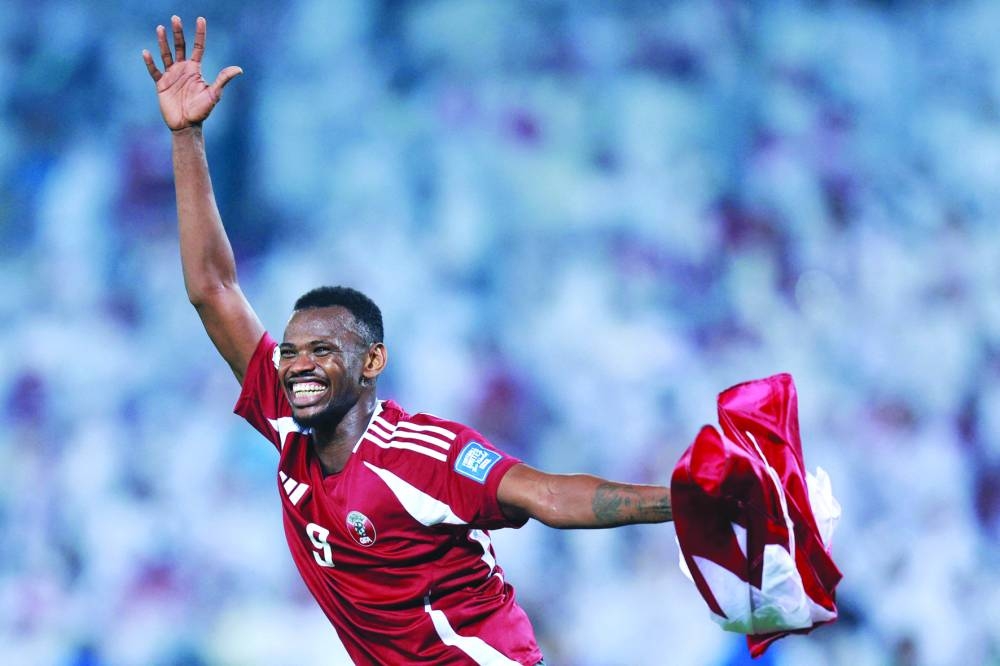Qatar's forward Mohammed Mountari celebrates at the end of the FIFA World Cup 2026 Asian qualifier against the UAE at Jassim Bin Hamad Stadium in Doha Tuesday. AFP