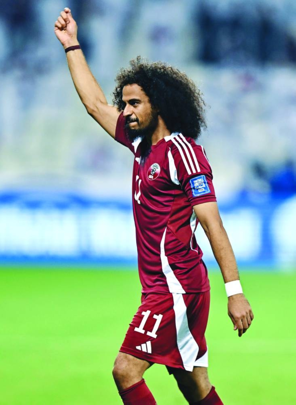 Qatar's Akram Afif celebrates against the United Arab Emirates.