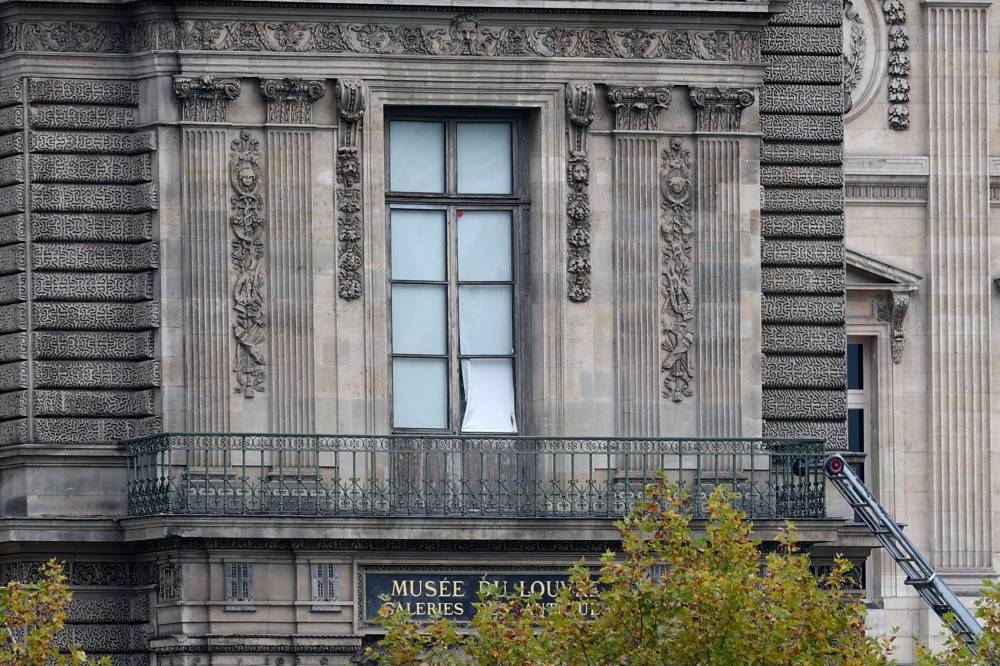 A window believed to have been used in what the French Interior Ministry said was a robbery at the Louvre museum during which jewellery was stolen, in Paris, on Sunday. REUTERS