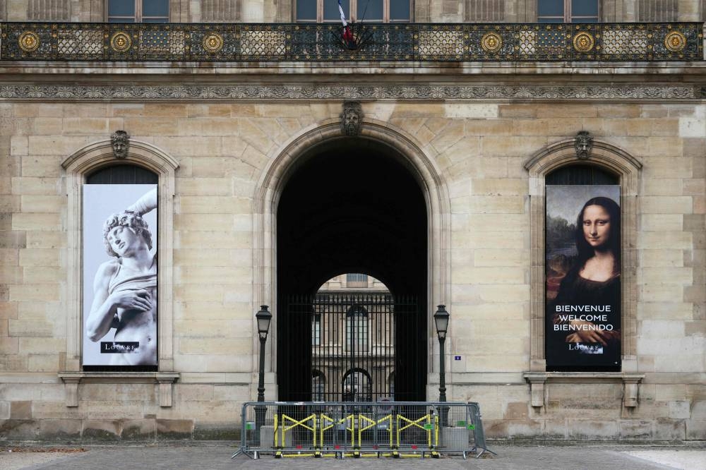 A closed access to the Louvre Museum after a robbery, in Paris, on Sunday. AFP