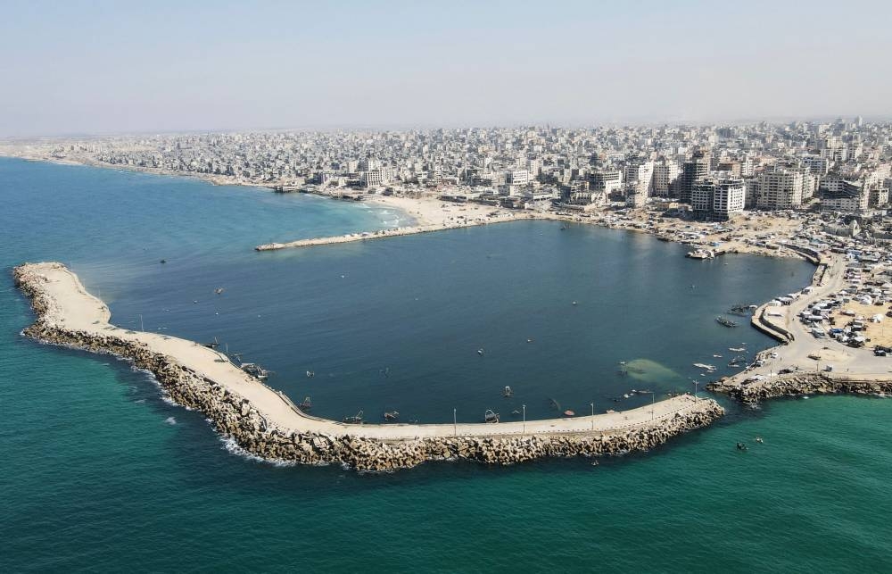 An aerial view shows the war-damaged port in Gaza City on Monday, during a US-brokered ceasefire between Israel and Palestinian factions. AFP