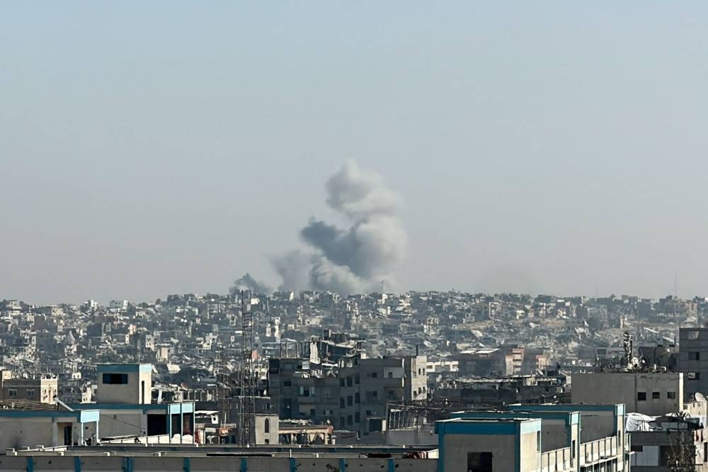 Smoke rises following an Israeli strike in Khan Younis, southern Gaza Strip, on Monday. REUTERS