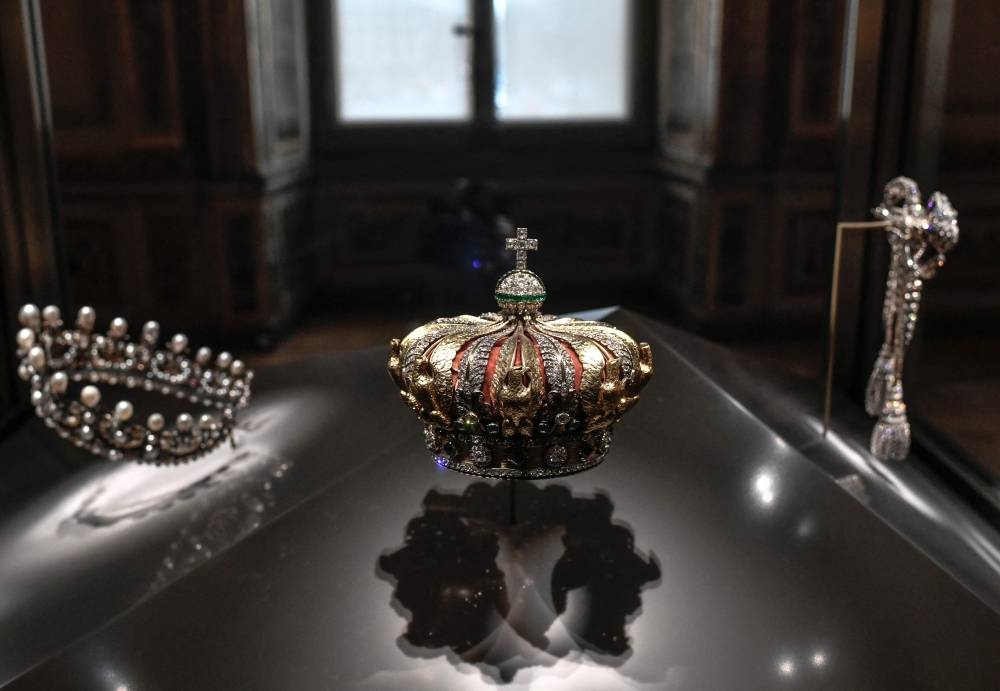 The crown of the Empress of the French Eugénie de Montijo displayed at Apollon's Gallery on January 14, 2020 at the Louvre museum in Paris after the reopening of the Gallery following ten months of renovations. AFP
