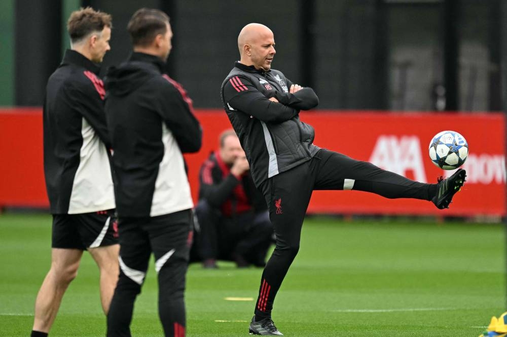 Liverpool&#039;s Dutch manager Arne Slot leads a training session at the team&#039;s training ground in Kirkby, north of Liverpool in northwest England, on Tuesday, on the eve of their UEFA Champions League league phase football match against Eintracht Frankfurt.  AFP