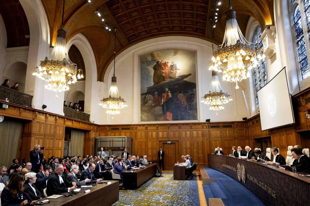 Lawyers and judges sit in the courtroom of the International Court of Justice (ICJ) in The Hague on Wednesday, as they gather with the court for the first day of hearings to issue an advisory opinion on Israel's obligations to provide assistance in the occupied Palestinian territories. AFP