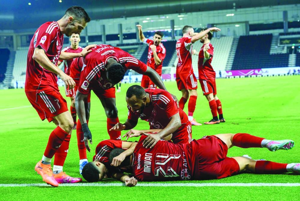Al Arabi players celebrate after Rodri Sanchez scored against Al Sadd at the Jassim Bin Hamad Stadium. PICTURE: Noushad Thekkayil