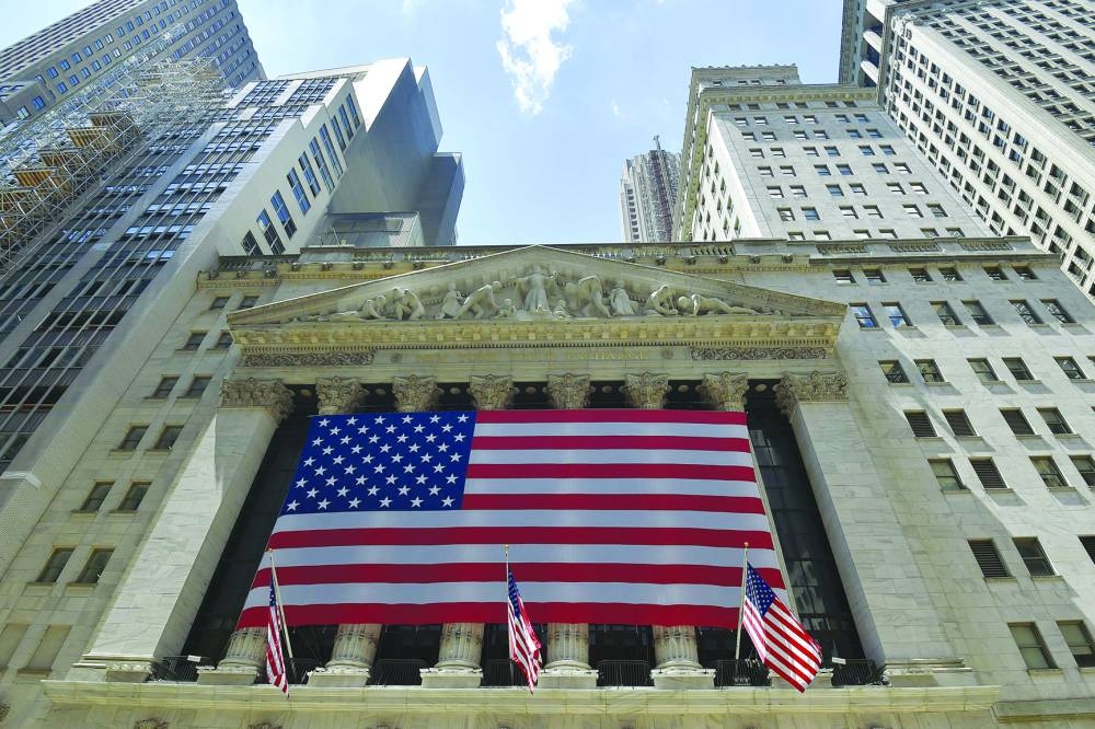 An external view of the New York Stock Exchange building. The US stock rally confronts a potentially consequential week to keep its momentum heading into year-end, including a flood of corporate results headlined by megacap companies and a likely interest rate cut by the Federal Reserve after its two-day policy meeting.