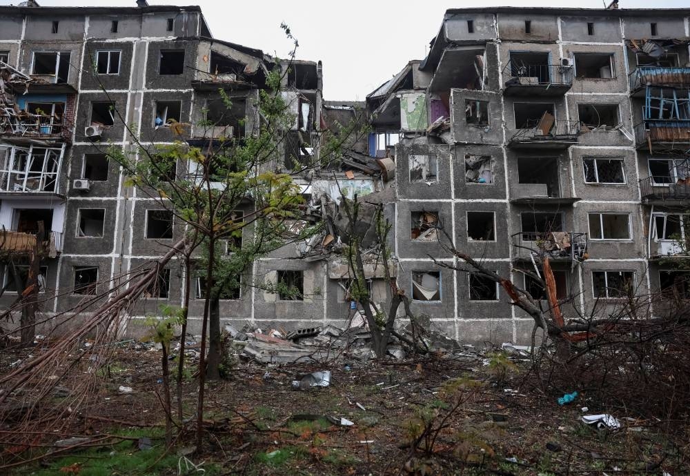 An apartment building damaged by a Russian military strike, amid Russia's attack on Ukraine, in the frontline town of Dobropillia in Donetsk region, Ukraine on Monday. REUTERS