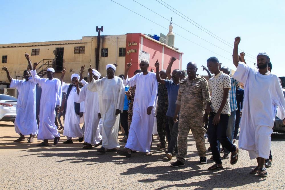 Local residents take part in a demonstration in Omdurman on Friday, to protest against the Rapid Support Forces’ reported “atrocities” in El-Fasher in western Sudan. AFP