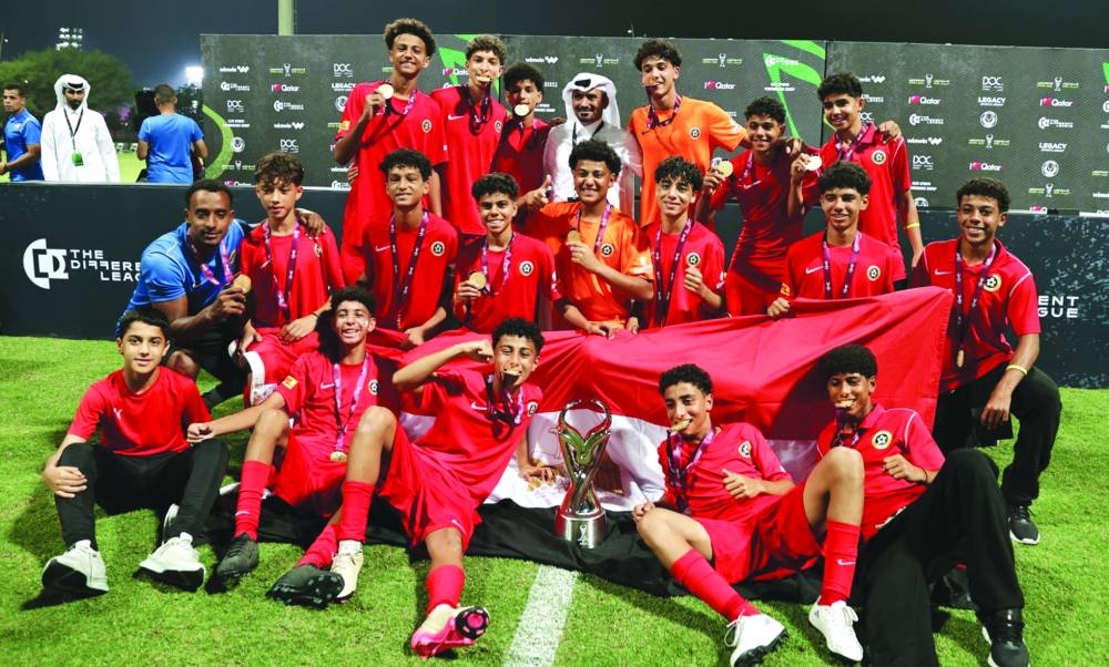 
Players of Egyptian academy ‘Right to Dream’ savour their title win. 