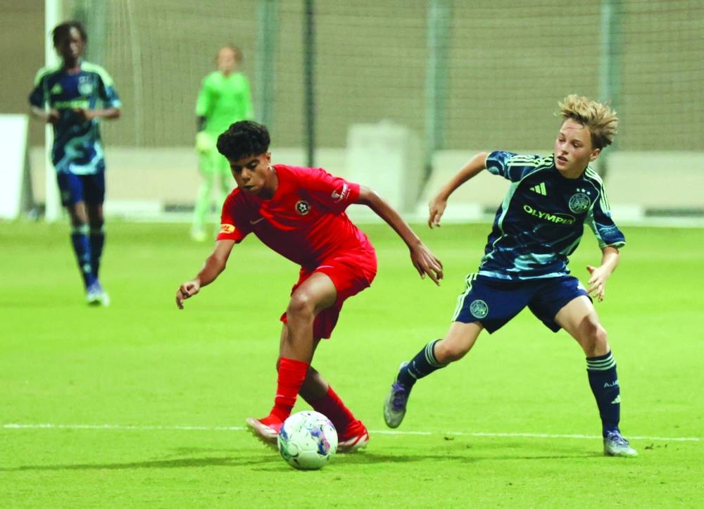 
Players of Egyptian academy ‘Right to Dream’ and Dutch team Ajax Amsterdam during the final. 