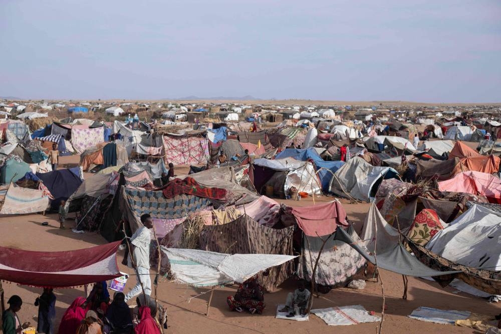 Makeshift shelters erected by displaced Sudanese who fled El-Fasher after the city fell to the Rapid Support Forces (RSF), make up the Um Yanqur camp, located on the southwestern edge of Tawila, on Monday. AFP