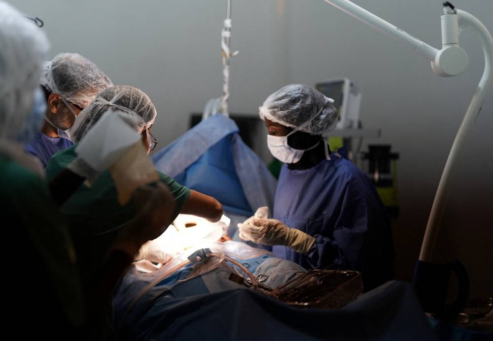 An injured displaced Sudanese man who fled violence in El-Fasher, receives treatment at a makeshift clinic run by Medecins Sans Frontieres (MSF), amid ongoing clashes between the paramilitary Rapid Support Forces (RSF) and the Sudanese army, in Tawila, North Darfur, Sudan on Monday. REUTERS