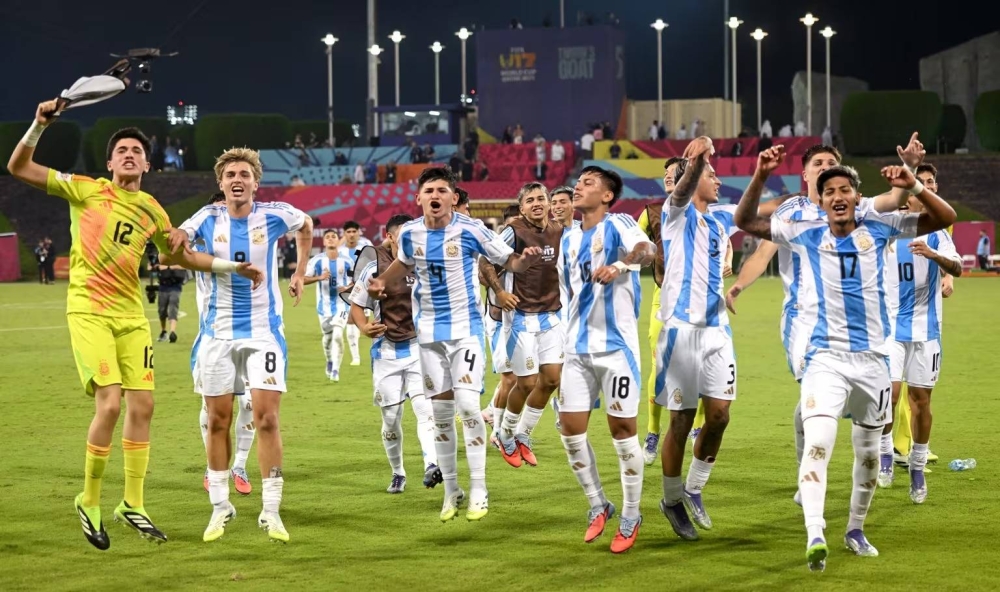 Argentina players celebrate after their win over Tunisia.