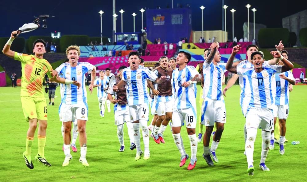 Argentina players celebrate after their win over Tunisia.