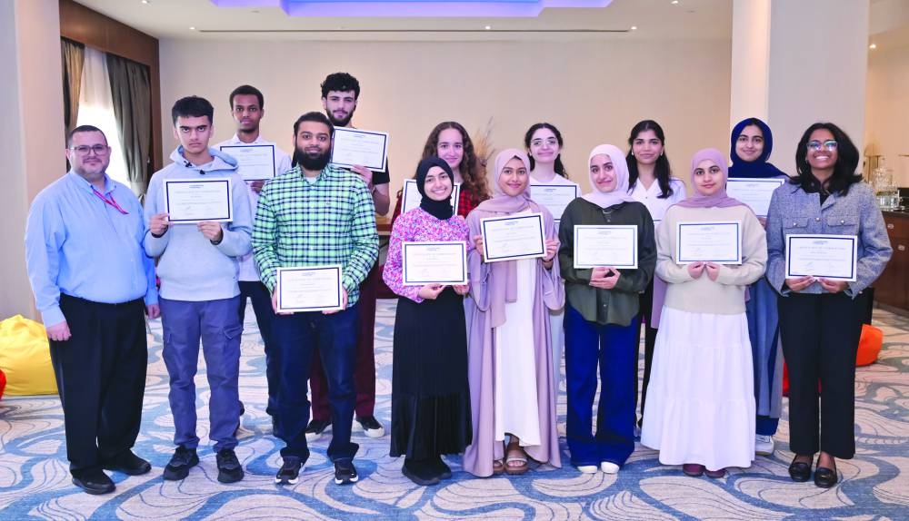 Dr Amjad Abdo with students who participated in the Student Leadership Challenge programme.