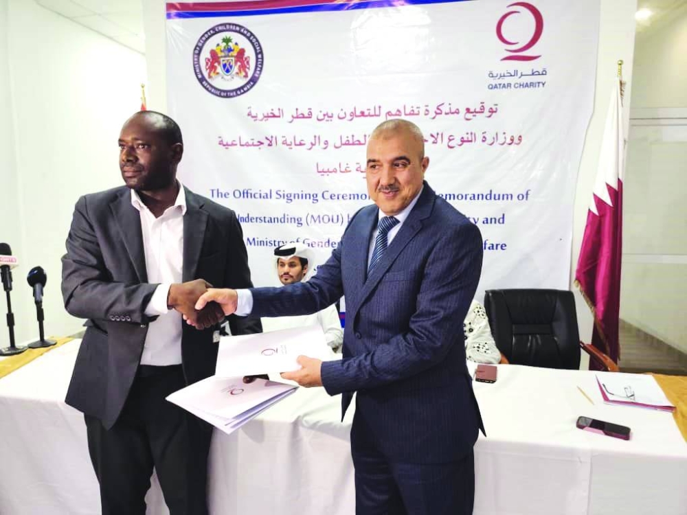 QC signs MoU Gambia’s Ministry of Gender, Children, and Social Welfare.