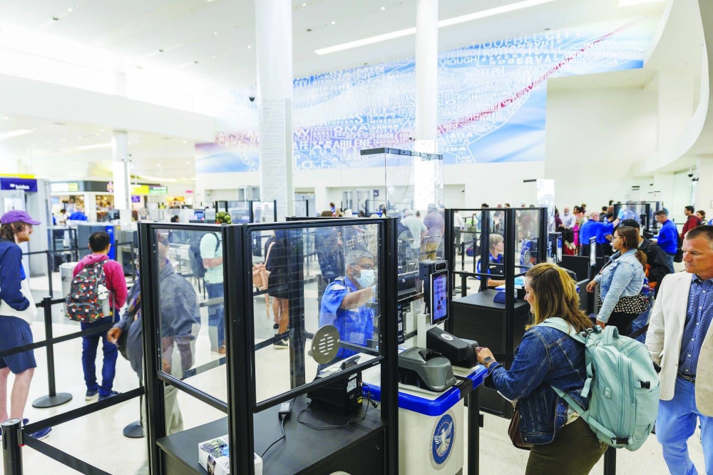 A traveller uses an identity verification machine at a security checkpoint at Baltimore-Washington Airport. Airports around the world are exploring new ways to improve security, ease congestion, and enhance the travel experience. One of the most promising innovations under consideration is the use of biometric digital ID technology to manage the segregation of international and domestic departing passengers. 
