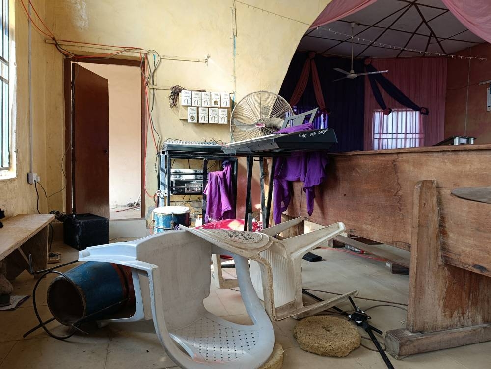 An interior view of the Christ Apostolic Church, the day after an attack by gunmen in which people were killed and the pastor and some worshippers kidnapped, in the town of Eruku, Kwara state, Nigeria, November 19, 2025.   REUTERS