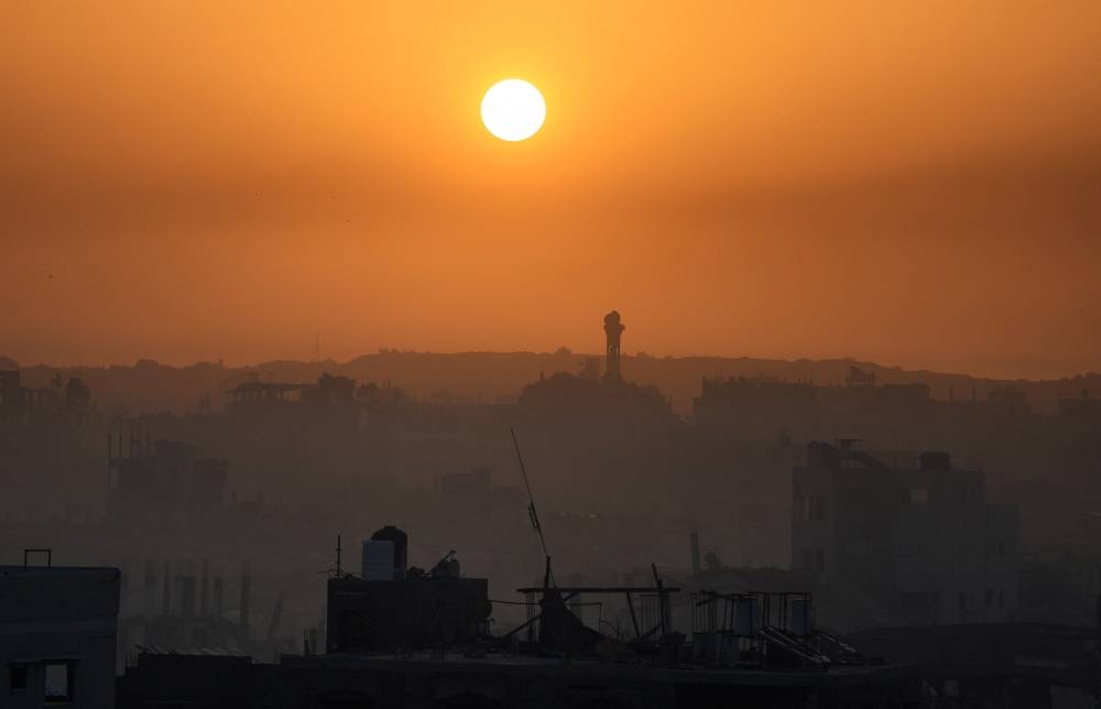 A view of Gaza City at sunrise, amid a ceasefire between Israel and Hamas, November 19, 2025. REUTERS/Dawoud Abu Alkas