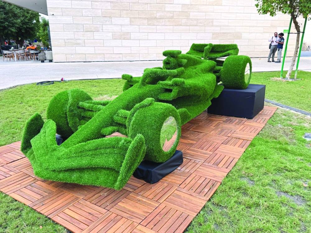 A life-size Formula 1 car sculpture made entirely of grass is ready to welcome fans ahead of the Qatar Grand Prix at Lusail Circuit.