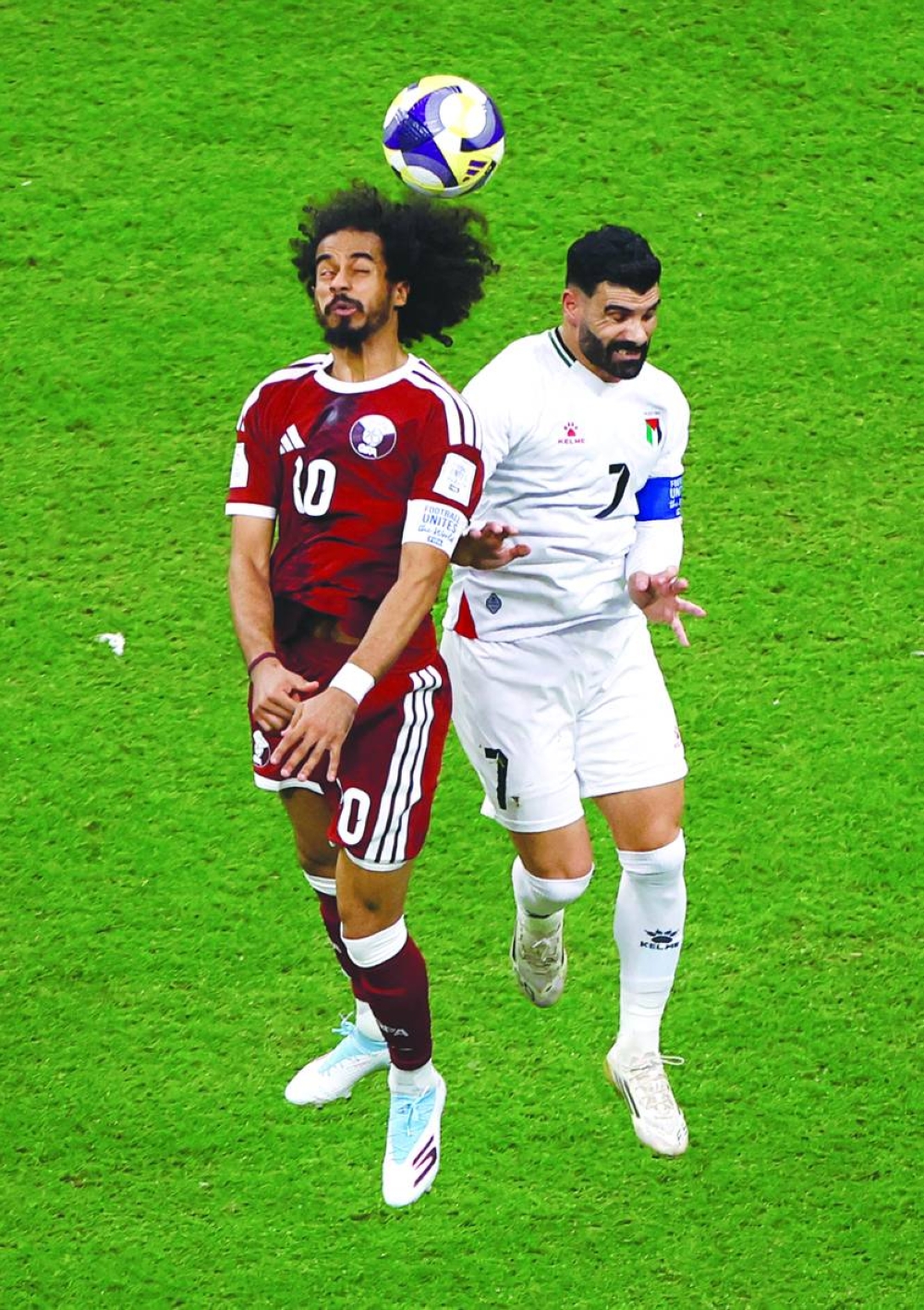 
Qatar’s Akram Afif in action with Palestine’s Musab Battat at Al Bayt Stadium. (Reuters) 