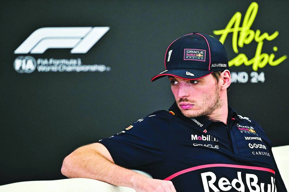 Red Bull Racing's Dutch driver Max Verstappen attends a press conference ahead of the Abu Dhabi Formula One Grand Prix at the Yas Marina Circuit in Abu Dhabi on December 4, 2025. (Photo by AFP)