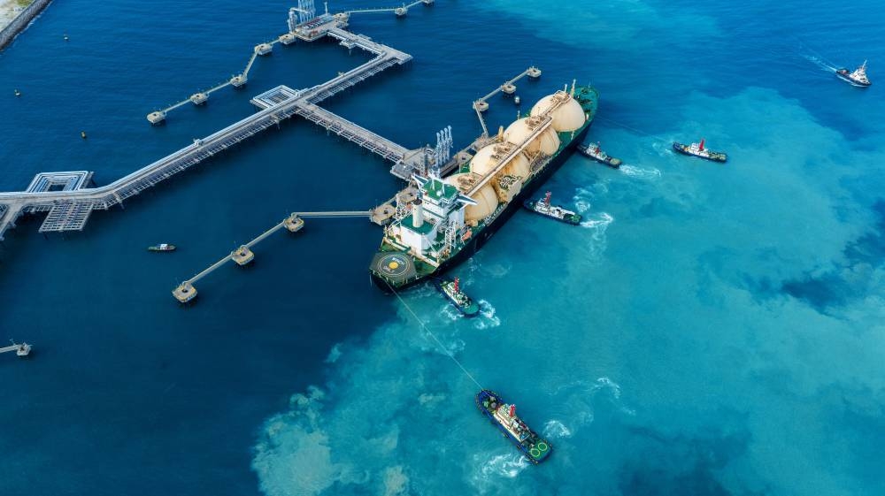 Liquefied natural gas tanker anchored in gas terminal for storage. Asian spot liquefied natural gas prices hit their lowest level in two months as high inventories and mild weather weighed on demand.  