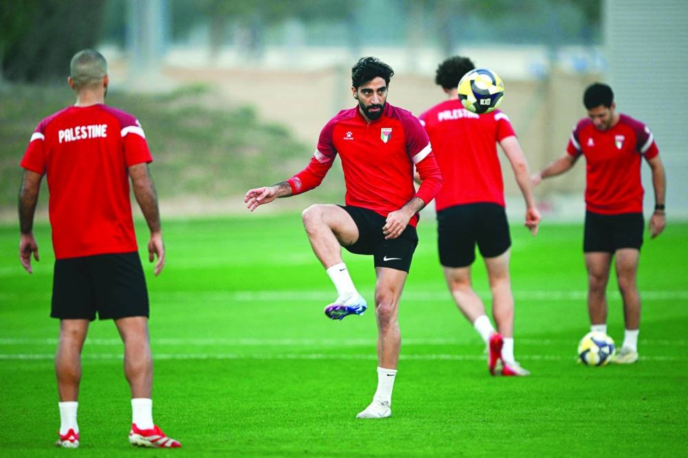 
Palestine’s players train yesterday ahead of their FIFA Arab Cup group stage match against Syria. A draw will ensure both side seal their place in the quarter-finals. 